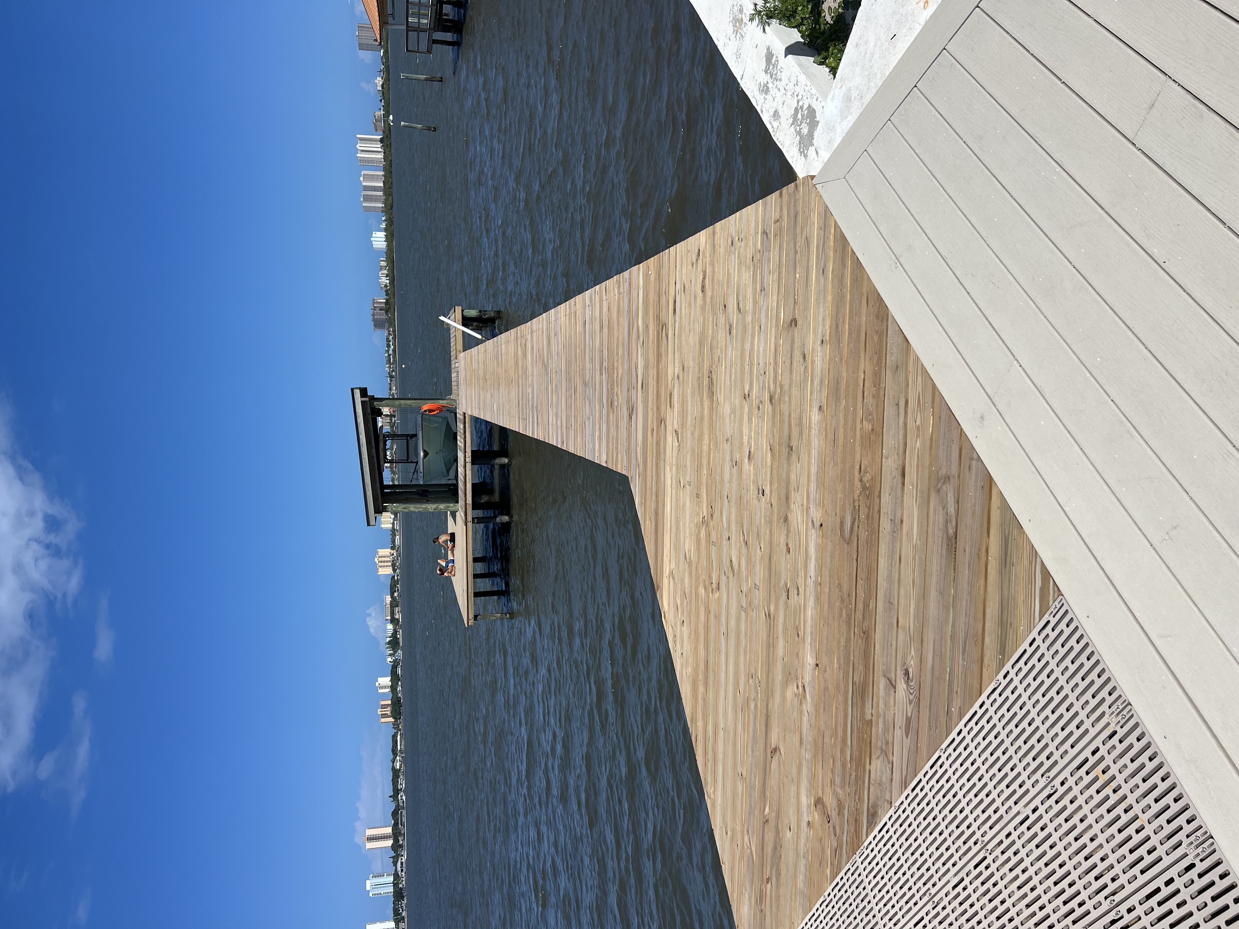 Residential dock, composite sundeck and covered boat lift on the Halifax River